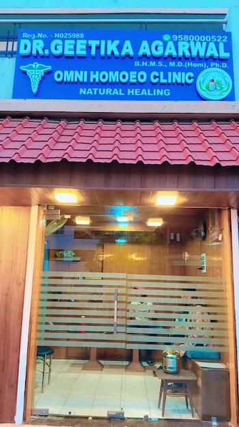 The Omni Homoeo Clinic storefront and signboard